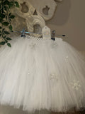 White snowflake tutu with silver glitter snowflake decorations and crystal gems