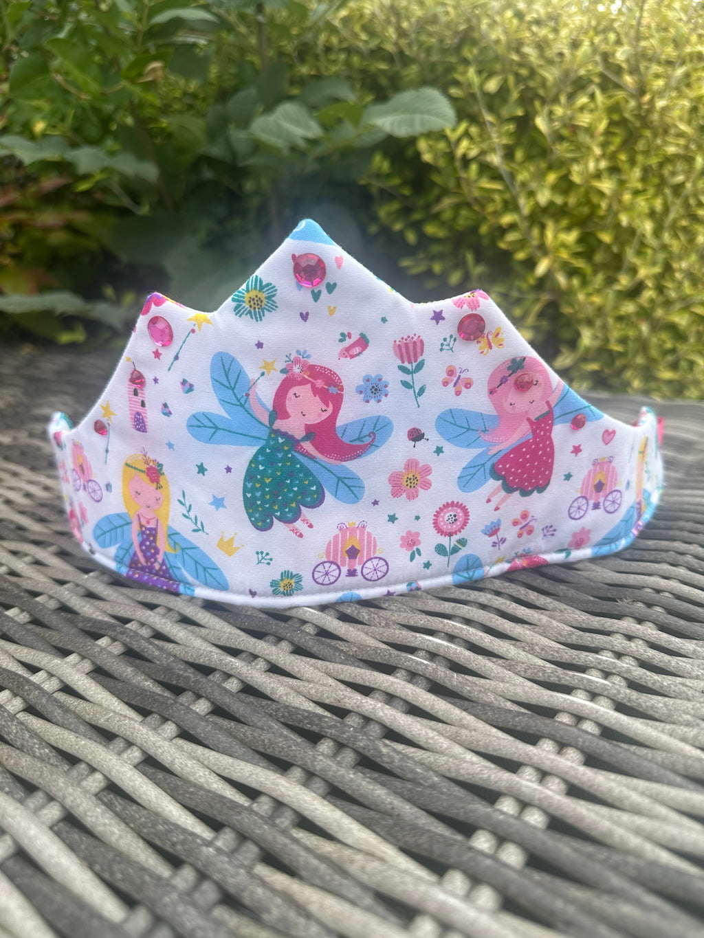 Close-up of the pastel mermaid and fairy print crown