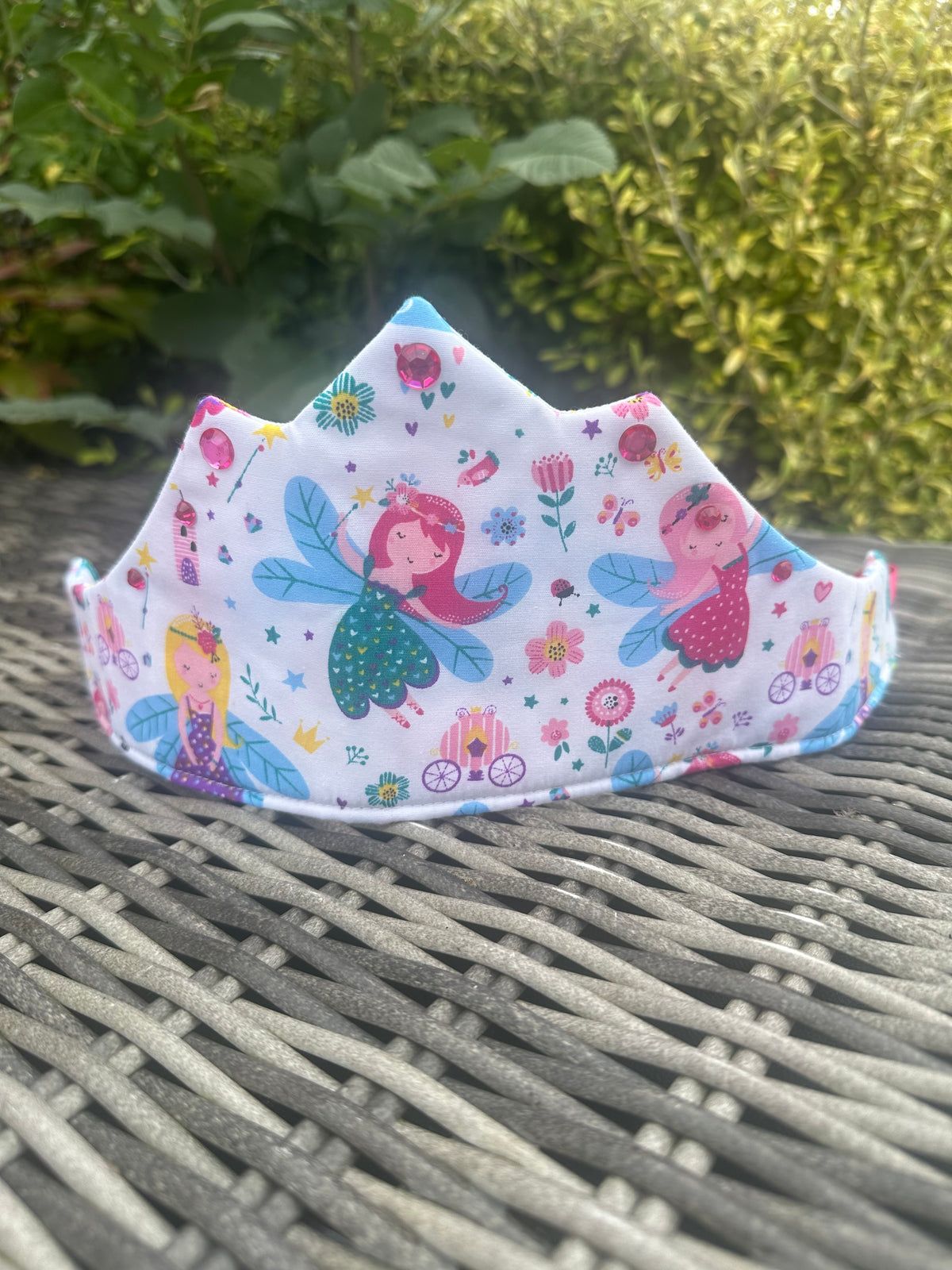 Close-up of the pastel mermaid and fairy print crown