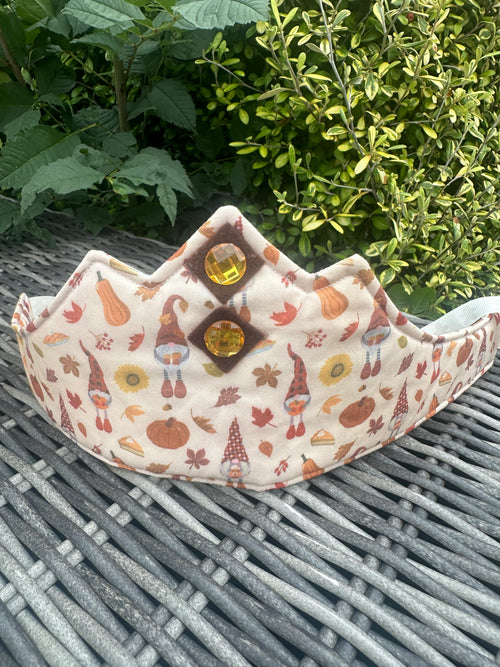 Autumn-themed crown with gnome, pumpkin and leaf print and amber-style gem details