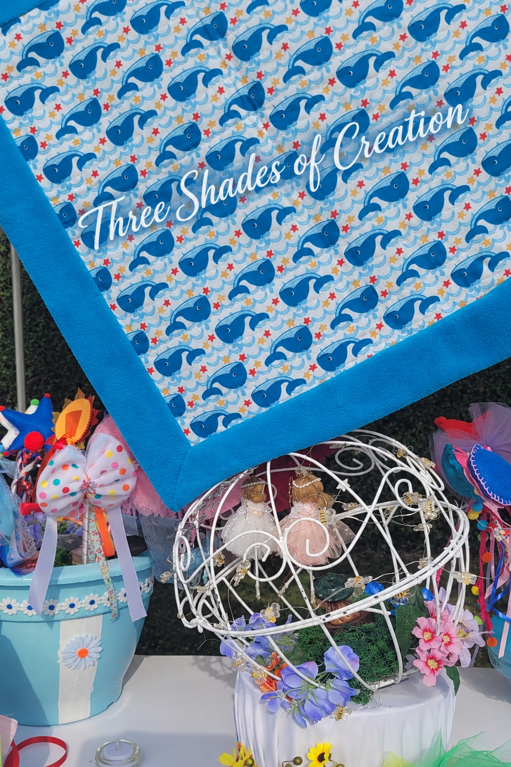 Blue whale children's quilt with Three Shades of Creation text watermark