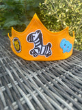 Handmade yellow felt crown with safari animal patches