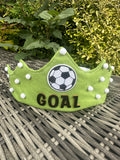 Lime green felt crown with football patch, white pompoms and GOAL lettering