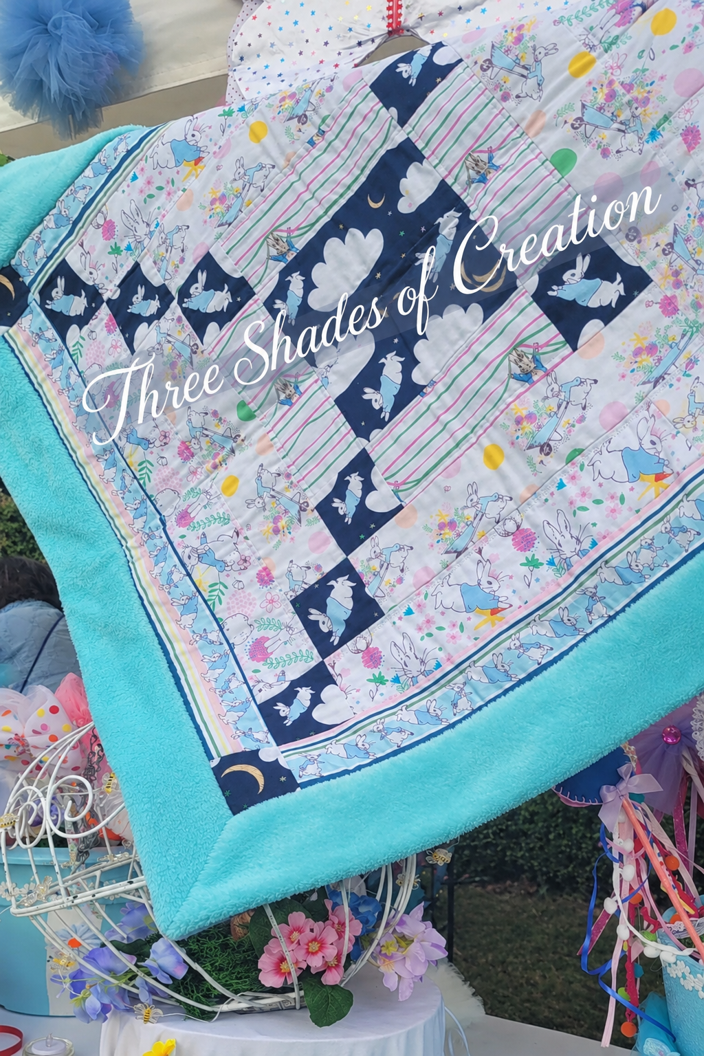 Peter Rabbit quilt with text watermark