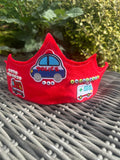 Red felt crown with embroidered police car, fire engine and ambulance patches with bead lettering