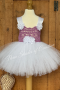 Purple crochet bodice and white tulle tutu dress with Three Shades of Creation text watermark