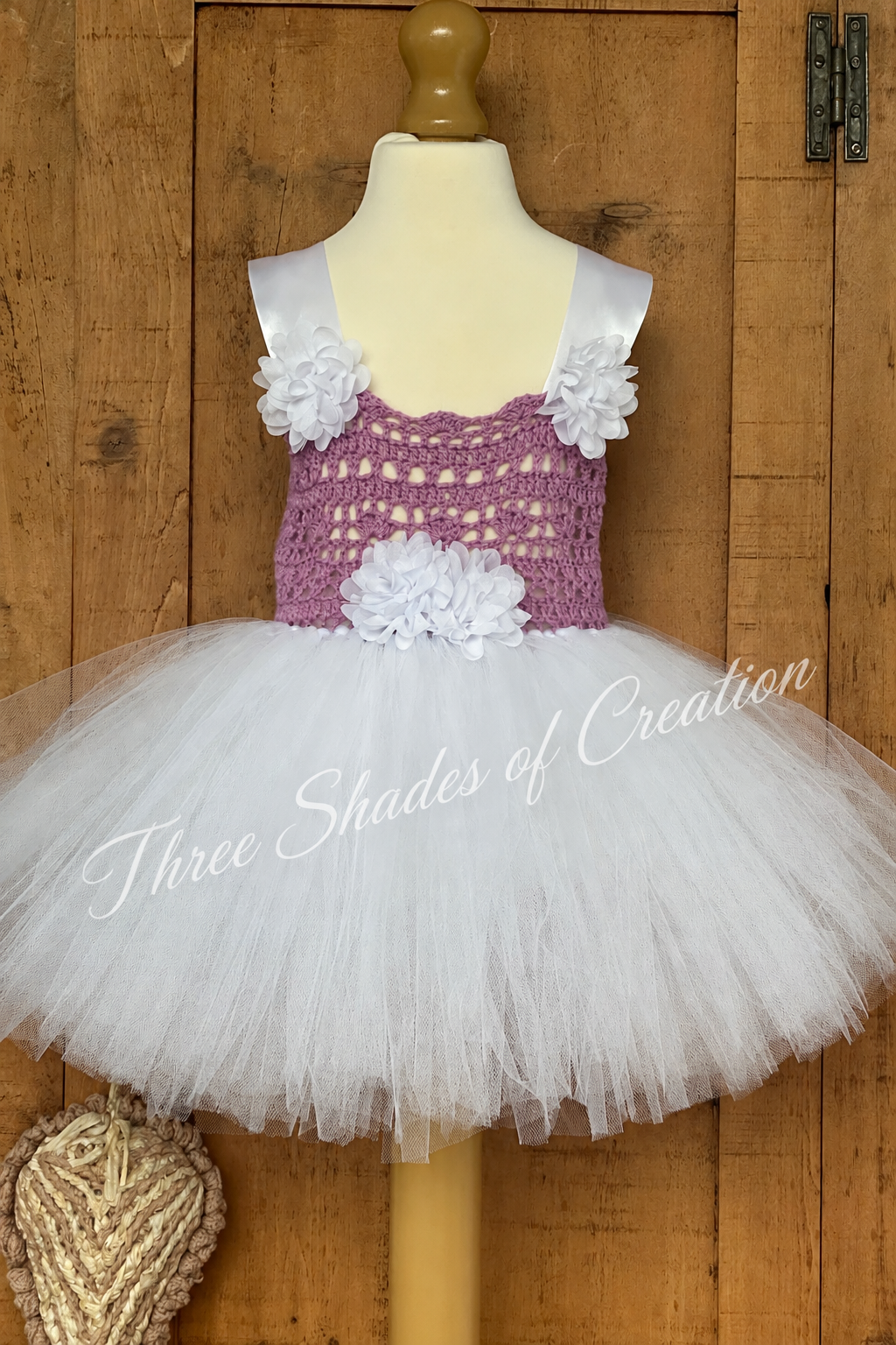 Purple crochet bodice and white tulle tutu dress with Three Shades of Creation text watermark