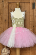 Sage green crochet tutu dress with pink and cream tulle and Three Shades of Creation text watermark