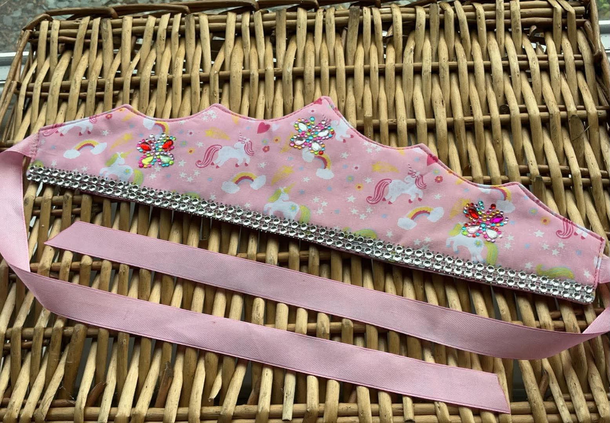 Handmade pink unicorn rainbow fabric crown with silver rhinestone trim and multicolour gem clusters