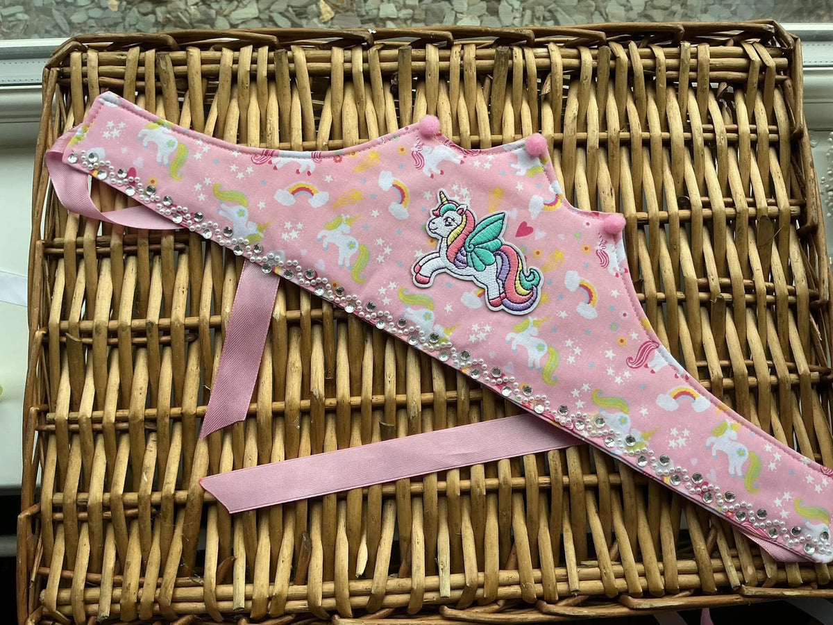 Handmade pink unicorn rainbow fabric crown with embroidered flying unicorn centrepiece, rhinestone trim and pink satin ribbon ties