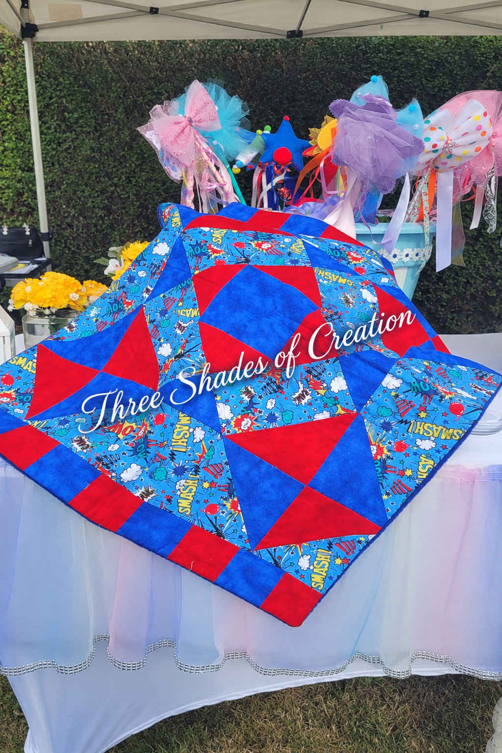 Superhero quilt with text watermark