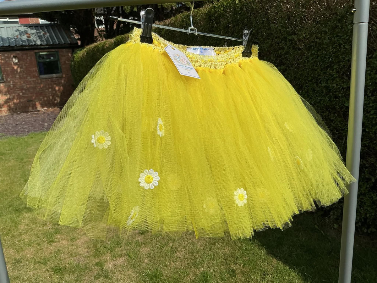 Yellow tutu skirt with white daisy flower embellishments